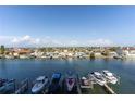 Waterfront property with multiple docks offering direct access to the Gulf of Mexico at 223 Island Way # 5E, Clearwater Beach, FL 33767