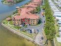 Waterfront condo complex with lush landscaping, ample parking, and gorgeous bay views at 2773 Via Cipriani # 1322A, Clearwater, FL 33764