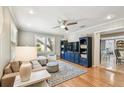 Cozy living room with natural light, ceiling fan, and stylish furnishings at 2815 W Estrella St, Tampa, FL 33629