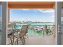 Relax on the balcony with stunning water views and enjoy the outdoor seating arrangement overlooking the marina at 530 S Gulfview Blvd # 303, Clearwater, FL 33767