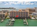 Exterior shot of building with convenient boat docks, providing easy access to the water at 530 S Gulfview Blvd # 303, Clearwater, FL 33767