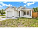 Well-maintained single Gathering home with a freshly mowed lawn at 5400 9Th N Ave, St Petersburg, FL 33710