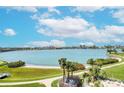 Breathtaking water view with lush landscaping, beautiful Intracoastal views, and blue skies at 7872 Sailboat Key S Blvd # 404, South Pasadena, FL 33707