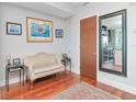 Modern condo entrance showing a comfortable chair and a decorative floor rug at 912 Channelside Dr # 2501, Tampa, FL 33602