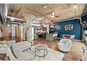 Stylish living space with an open concept, concrete ceilings, kitchen and modern furnishings at 101 N 12Th St # 206, Tampa, FL 33602