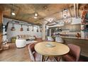 The living area features an open-concept design, a kitchen and a variety of musical instruments on the walls at 101 N 12Th St # 206, Tampa, FL 33602