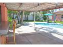 Entertain in your backyard that includes a covered bar area and pool at 340 81St Ave, St Pete Beach, FL 33706