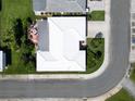 A top-down aerial view reveals the property's manicured lawn and patio at 3800 101St N Ter # 3800, Pinellas Park, FL 33782