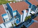 Well maintained condos with rooftop decks and manicured landscaping at 343 Rex Pl # G, Madeira Beach, FL 33708
