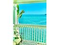 Beautiful waterfront view from a private balcony with outdoor seating and Gulf views at 5285 Coquina Key Se Dr # C, St Petersburg, FL 33705