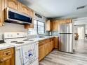 Bright kitchen featuring stainless steel appliances and beautiful countertops at 2425 Auburn S St, St Petersburg, FL 33712