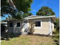 Lovely single-story home with freshly cut grass and lots of sunlight at 5211 Jersey S Ave, Gulfport, FL 33707