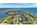 Aerial view of waterfront property with private dock access at 6317 Marbella Blvd, Apollo Beach, FL 33572