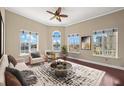 Bright living room with hardwood floors and large windows offering a beautiful city view at 700 S Harbour Island Blvd # 813, Tampa, FL 33602