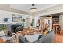 Stylish living room features elegant décor, modern furniture, and an eye-catching decorative fireplace at 720 Brightwaters Ne Blvd, St Petersburg, FL 33704