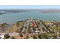 Aerial view of a home near a bay, showcasing its location and neighborhood at 7909 Garden N Dr, St Petersburg, FL 33710