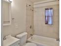 Standard bathroom features a tiled shower-tub combination and vanity at 1601 24Th S St, St Petersburg, FL 33712