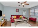 Relaxing living area featuring comfortable seating, abundant natural light, and stylish decor for a cozy ambiance at 5850 21St N St # 12, St Petersburg, FL 33714