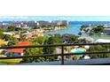 Beautiful view from the balcony overlooking the pool and waterfront neighborhood at 5940 Pelican Bay S Plz # 1105, Gulfport, FL 33707
