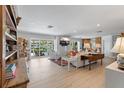 Bright and airy living room with hardwood floors, water views, and comfortable seating at 1112 38Th Ne Ave, St Petersburg, FL 33704