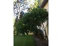 Lush foliage and blooming flowers add to the curb appeal of this well-maintained property at 501 East Bay Dr. # 2003, Largo, FL 33770