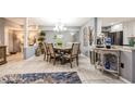 Formal dining room has seating for six and opens up into the kitchen at 8198 Terrace Garden N Dr # 411, St Petersburg, FL 33709