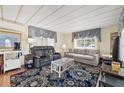 Cozy living room offers a comfortable seating area with natural light and stylish accents at 9790 66Th N St # 160, Pinellas Park, FL 33782