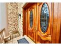 Elegant double front door with decorative glass panels and sidelights at 441 Lucerne Ave, Tampa, FL 33606