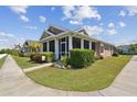 Beautiful single-Gathering home with a screened-in porch and professionally landscaped yard at 5702 Tides Pl, Apollo Beach, FL 33572