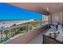 Balcony with ocean view and outdoor seating at 1310 Gulf Blvd # 5C, Clearwater Beach, FL 33767