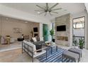 Covered outdoor living space with fireplace and easy access to the indoor living areas at 3411 W El Prado Blvd, Tampa, FL 33629