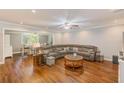 Spacious living room boasts hardwood floors, crown molding, and an open layout at 533 Keene Rd, Largo, FL 33771