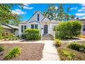 Charming home with lush landscaping and a welcoming front entrance at 150 23Rd N Ave, St Petersburg, FL 33704