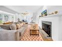 Cozy living room featuring a fireplace, comfortable seating, and stylish decor for relaxation at 150 23Rd N Ave, St Petersburg, FL 33704
