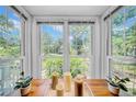 Bright room featuring large windows offering natural light with a picturesque view of the outdoors at 150 23Rd N Ave, St Petersburg, FL 33704