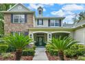 Charming home with meticulously landscaped front entrance and beautiful stone accents at 5806 Terncrest Dr, Lithia, FL 33547