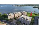 Aerial view showcasing the condo community's proximity to the waterfront at 600 Reserve Ln, Dunedin, FL 34698