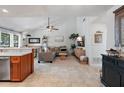 Open living area featuring neutral colors, a ceiling fan, and tile flooring at 6262 142Nd N Ave # 1106, Clearwater, FL 33760