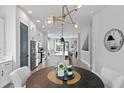 Bright, open-concept dining area offering seamless access to the kitchen and other living spaces at 98 29Th S St, St Petersburg, FL 33712