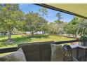 This cozy balcony overlooks the lush, landscaped community grounds and offers serene views at 36750 Us 19 N # 22212, Palm Harbor, FL 34684