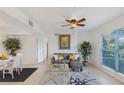 Bright living room featuring neutral color palette, modern furniture and ample natural light at 455 Alt 19 # 111, Palm Harbor, FL 34683