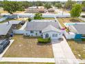 Aerial view of a cozy single-story home with a fenced backyard at 2605 Fulton Sw St, Largo, FL 33774