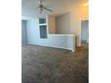 Neutral colored Living Room has vaulted ceilings and a calming color scheme at 5904 Willow Ridge Dr # 202, Zephyrhills, FL 33541