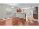 Bright and airy living room featuring hardwood floors, neutral paint and lots of natural light at 13423 Lake Monroe Pl, Riverview, FL 33579