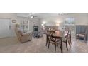 Comfortable living room with dining area, tile floors and natural light at 2404 Dovesong Trace Dr, Ruskin, FL 33570
