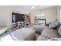 Comfortable living room features neutral tones, ample seating, and wood-look flooring at 4568 67Th N St, St Petersburg, FL 33709