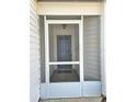 Inviting front porch with tiled floor and view of the front door for added security and curb appeal at 12121 Wildbrook Dr, Riverview, FL 33569
