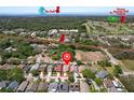 Aerial view of a neighborhood showing proximity to the Gulf, bike trails, and golf at 1666 Meadow Oak Ln, Tarpon Springs, FL 34689