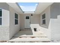 Inviting front entrance with clean lines, fresh paint, and ample natural light at 7313 8Th N Ave, St Petersburg, FL 33710