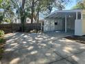 Spacious carport and driveway area offer convenient parking and backyard access at 4310 7Th S St, St Petersburg, FL 33705
